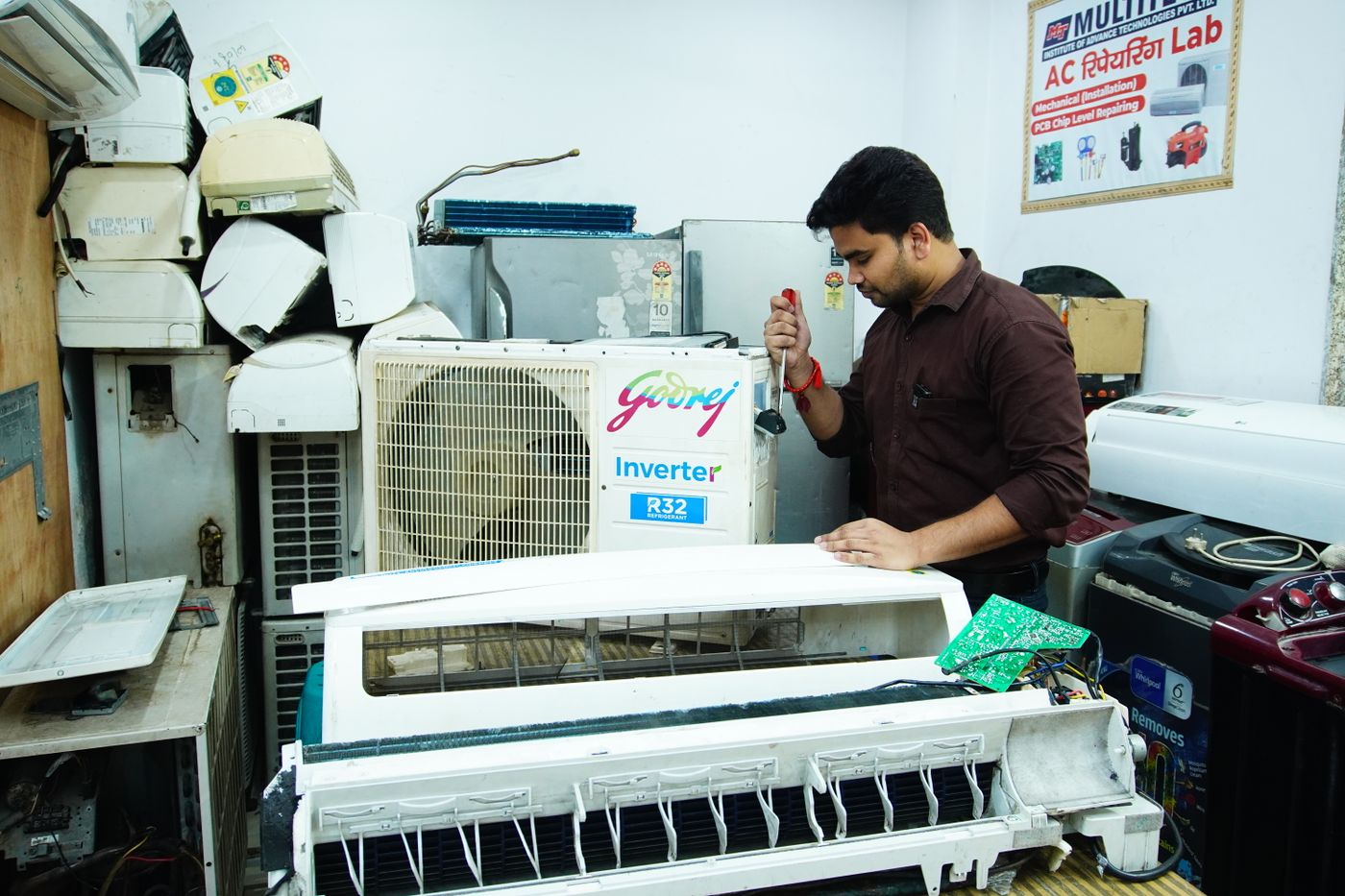 HVAC technician servicing a system
